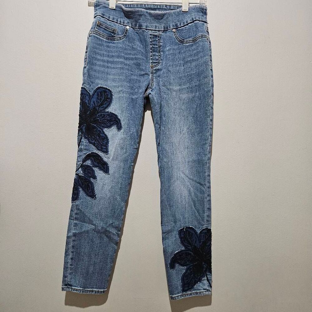 Chico's  embroidered floral stretch pull-on jeans featuring distinctive black wh